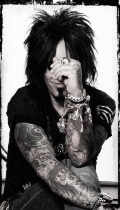 Nikki Sixx Skull And Rose Tatoos